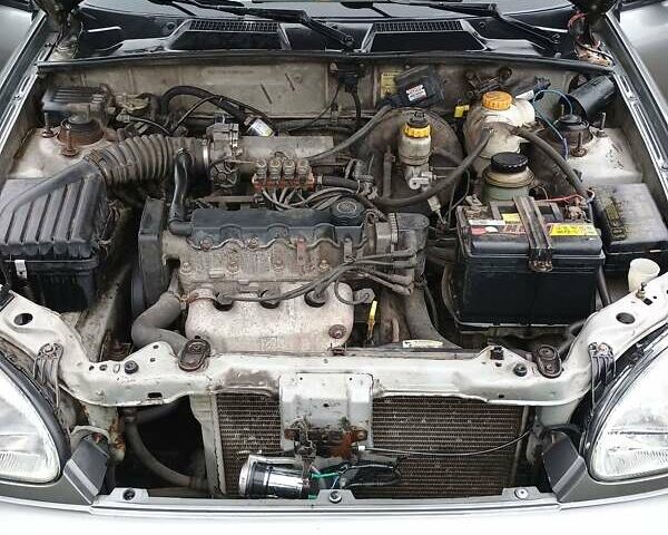 Сірий Деу Ланос, об'ємом двигуна 1.5 л та пробігом 312 тис. км за 2600 $, фото 10 на Automoto.ua