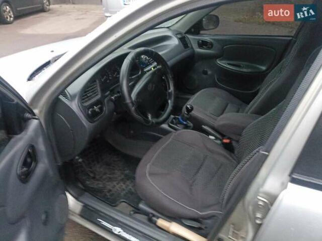 Серый Дэу Ланос, объемом двигателя 1.5 л и пробегом 306 тыс. км за 1750 $, фото 2 на Automoto.ua