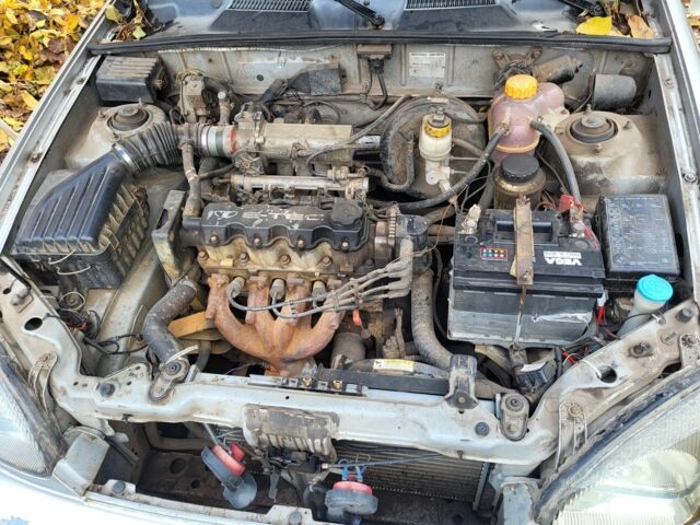 Деу Ланос 2002 у Сумах на Automoto.ua Сірий Деу Ланос, об'ємом двигуна 1.5 л та пробігом 258 тис. км за 1429 $, фото 7 на Automoto.ua