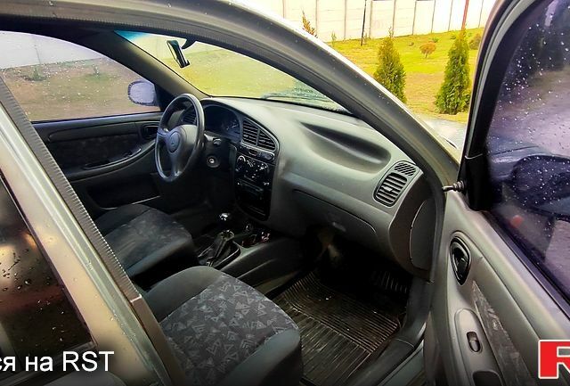 Сірий Деу Ланос, об'ємом двигуна 1.5 л та пробігом 184 тис. км за 1900 $, фото 4 на Automoto.ua