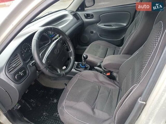 Сірий Деу Ланос, об'ємом двигуна 1.5 л та пробігом 306 тис. км за 2000 $, фото 5 на Automoto.ua