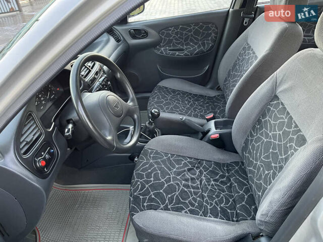 Серый Дэу Ланос, объемом двигателя 1.5 л и пробегом 152 тыс. км за 1999 $, фото 23 на Automoto.ua