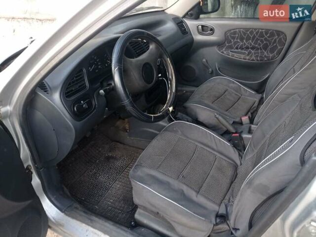 Сірий Деу Ланос, об'ємом двигуна 1.3 л та пробігом 270 тис. км за 2000 $, фото 4 на Automoto.ua