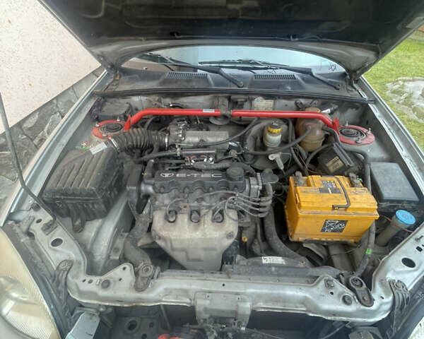 Сірий Деу Ланос, об'ємом двигуна 1.5 л та пробігом 141 тис. км за 1700 $, фото 10 на Automoto.ua