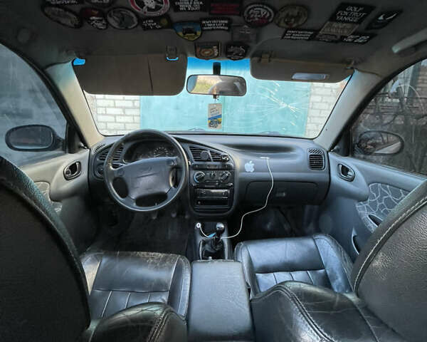 Серый Дэу Ланос, объемом двигателя 1.6 л и пробегом 500 тыс. км за 1600 $, фото 11 на Automoto.ua