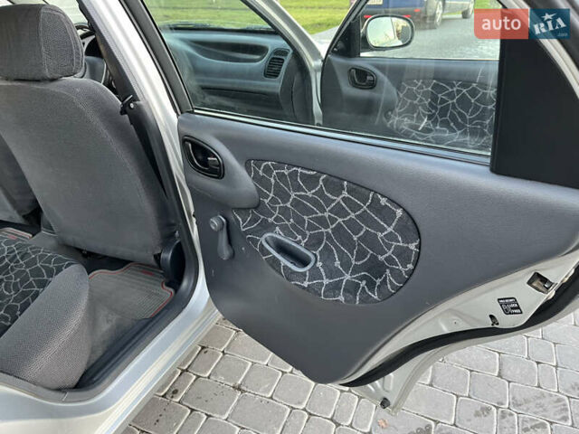 Серый Дэу Ланос, объемом двигателя 1.5 л и пробегом 152 тыс. км за 1999 $, фото 28 на Automoto.ua