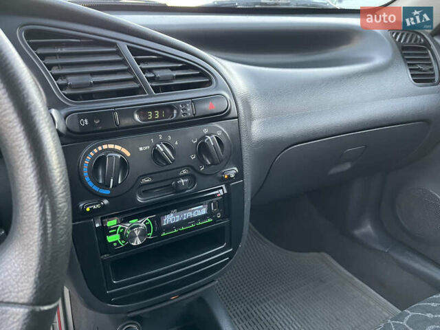 Серый Дэу Ланос, объемом двигателя 1.5 л и пробегом 152 тыс. км за 1999 $, фото 18 на Automoto.ua