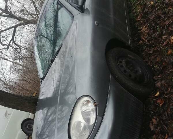 Серый Дэу Ланос, объемом двигателя 1.5 л и пробегом 220 тыс. км за 2200 $, фото 2 на Automoto.ua