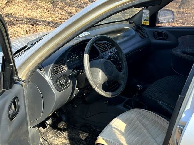 Сірий Деу Ланос, об'ємом двигуна 1.5 л та пробігом 250 тис. км за 999 $, фото 7 на Automoto.ua