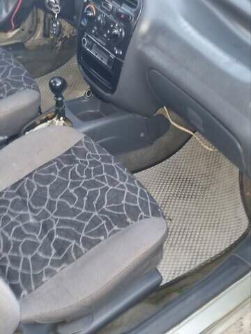 Серый Дэу Ланос, объемом двигателя 1.5 л и пробегом 300 тыс. км за 1000 $, фото 5 на Automoto.ua