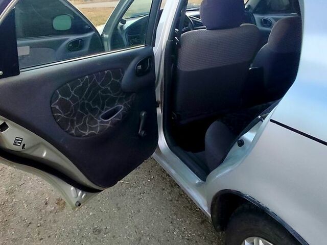 Сірий Деу Ланос, об'ємом двигуна 1.5 л та пробігом 0 тис. км за 1800 $, фото 2 на Automoto.ua