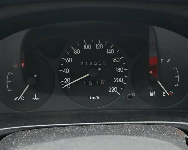 Серый Дэу Ланос, объемом двигателя 1.5 л и пробегом 314 тыс. км за 1500 $, фото 5 на Automoto.ua