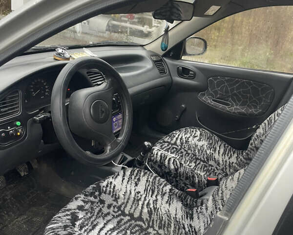 Сірий Деу Ланос, об'ємом двигуна 1.5 л та пробігом 230 тис. км за 1900 $, фото 7 на Automoto.ua