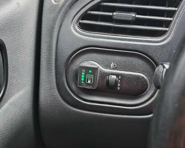 Серый Дэу Ланос, объемом двигателя 1.5 л и пробегом 314 тыс. км за 1500 $, фото 4 на Automoto.ua