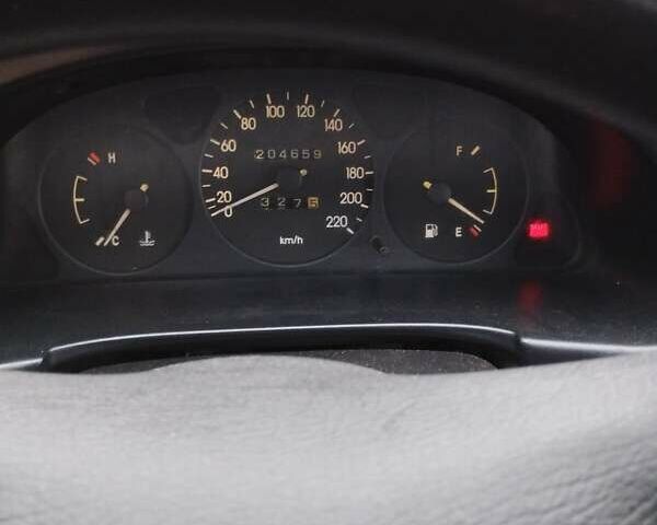 Серый Дэу Ланос, объемом двигателя 1.3 л и пробегом 204 тыс. км за 2000 $, фото 13 на Automoto.ua