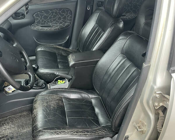 Серый Дэу Ланос, объемом двигателя 1.6 л и пробегом 500 тыс. км за 1600 $, фото 9 на Automoto.ua