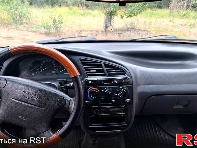 Серый Дэу Ланос, объемом двигателя 1.6 л и пробегом 220 тыс. км за 2650 $, фото 7 на Automoto.ua