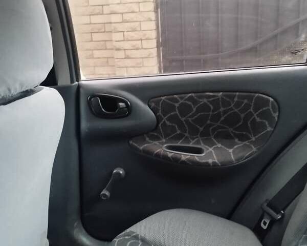 Сірий Деу Ланос, об'ємом двигуна 1.5 л та пробігом 158 тис. км за 2300 $, фото 13 на Automoto.ua