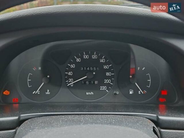 Серый Дэу Ланос, объемом двигателя 1.5 л и пробегом 314 тыс. км за 1500 $, фото 6 на Automoto.ua