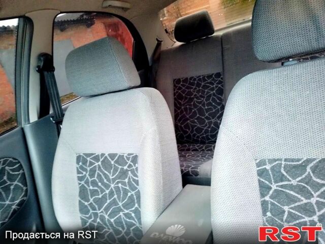 Серый Дэу Ланос, объемом двигателя 1.5 л и пробегом 300 тыс. км за 2300 $, фото 2 на Automoto.ua