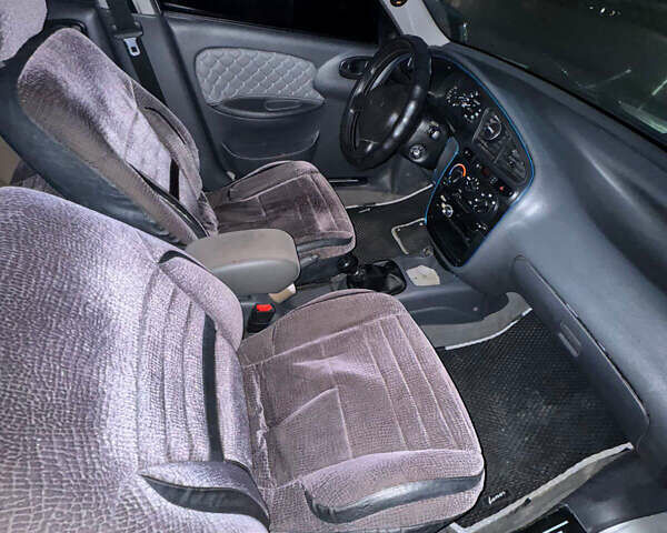 Сірий Деу Ланос, об'ємом двигуна 1.5 л та пробігом 248 тис. км за 3100 $, фото 10 на Automoto.ua