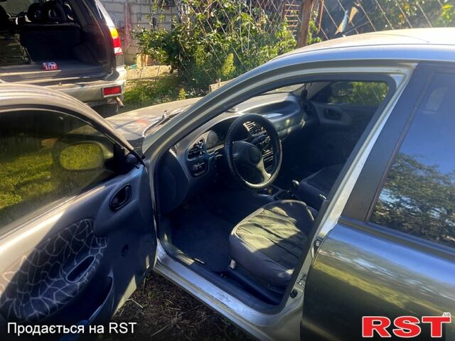 Сірий Деу Ланос, об'ємом двигуна 1.3 л та пробігом 170 тис. км за 1300 $, фото 2 на Automoto.ua