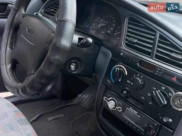 Сірий Деу Ланос, об'ємом двигуна 1.5 л та пробігом 378 тис. км за 1599 $, фото 10 на Automoto.ua