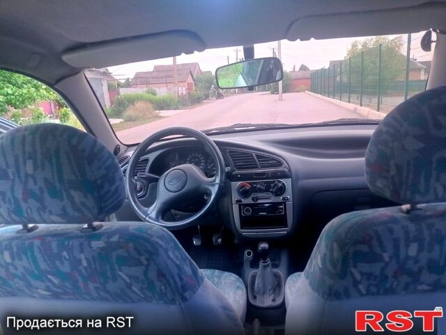 Серый Дэу Ланос, объемом двигателя 1.6 л и пробегом 250 тыс. км за 2700 $, фото 8 на Automoto.ua