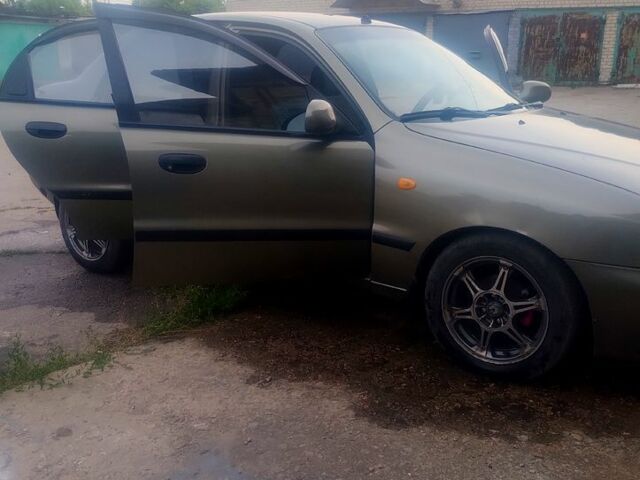 Сірий Деу Ланос, об'ємом двигуна 1.3 л та пробігом 200 тис. км за 1750 $, фото 5 на Automoto.ua