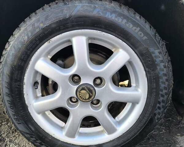 Серый Дэу Ланос, объемом двигателя 0 л и пробегом 166 тыс. км за 3100 $, фото 18 на Automoto.ua