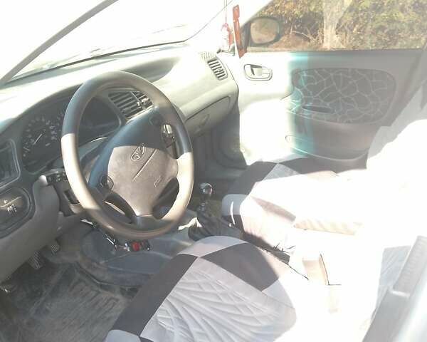 Серый Дэу Ланос, объемом двигателя 1.6 л и пробегом 321 тыс. км за 1400 $, фото 6 на Automoto.ua