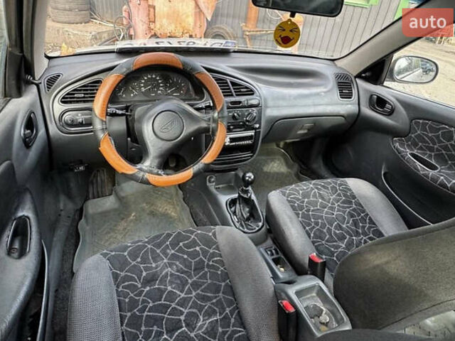 Сірий Деу Ланос, об'ємом двигуна 1.5 л та пробігом 245 тис. км за 1199 $, фото 3 на Automoto.ua