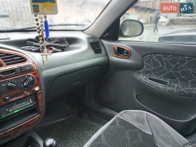 Серый Дэу Ланос, объемом двигателя 1.5 л и пробегом 350 тыс. км за 2400 $, фото 8 на Automoto.ua