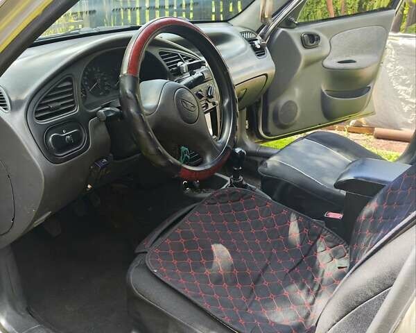 Серый Дэу Ланос, объемом двигателя 1.5 л и пробегом 300 тыс. км за 1750 $, фото 20 на Automoto.ua