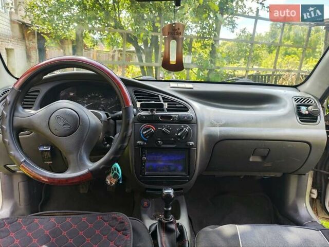 Серый Дэу Ланос, объемом двигателя 1.5 л и пробегом 300 тыс. км за 1750 $, фото 21 на Automoto.ua