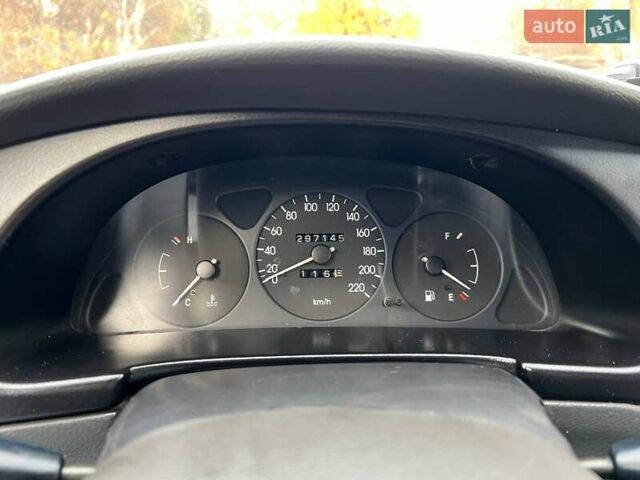 Сірий Деу Ланос, об'ємом двигуна 1.5 л та пробігом 297 тис. км за 1850 $, фото 13 на Automoto.ua