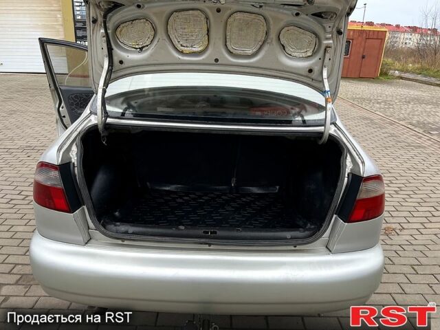 Сірий Деу Ланос, об'ємом двигуна 1.5 л та пробігом 281 тис. км за 2000 $, фото 4 на Automoto.ua