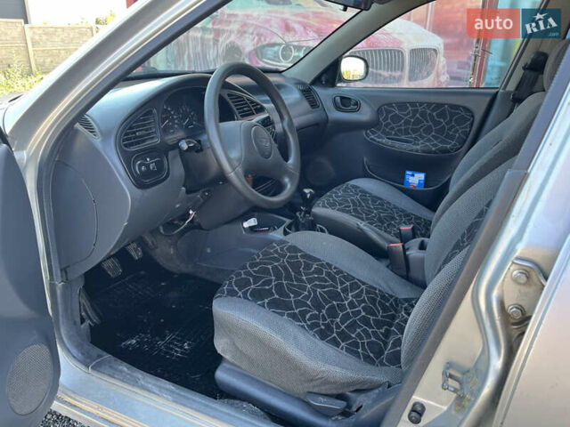 Серый Дэу Ланос, объемом двигателя 1.5 л и пробегом 300 тыс. км за 1600 $, фото 3 на Automoto.ua