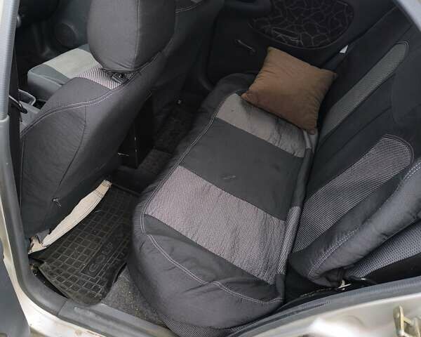 Сірий Деу Ланос, об'ємом двигуна 1.5 л та пробігом 175 тис. км за 2000 $, фото 3 на Automoto.ua