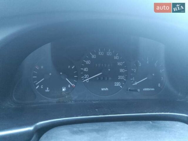 Серый Дэу Ланос, объемом двигателя 1.6 л и пробегом 321 тыс. км за 1400 $, фото 11 на Automoto.ua