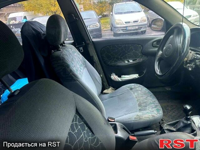 Сірий Деу Ланос, об'ємом двигуна 1.5 л та пробігом 238 тис. км за 2200 $, фото 5 на Automoto.ua