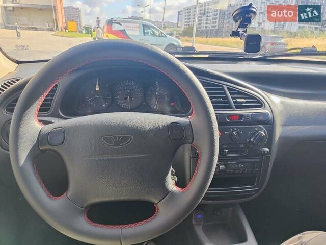 Сірий Деу Ланос, об'ємом двигуна 1.5 л та пробігом 229 тис. км за 1850 $, фото 27 на Automoto.ua