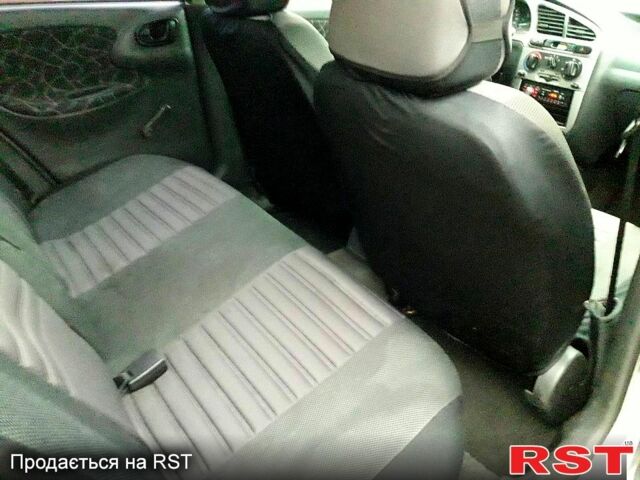 Серый Дэу Ланос, объемом двигателя 1.6 л и пробегом 182 тыс. км за 2499 $, фото 11 на Automoto.ua