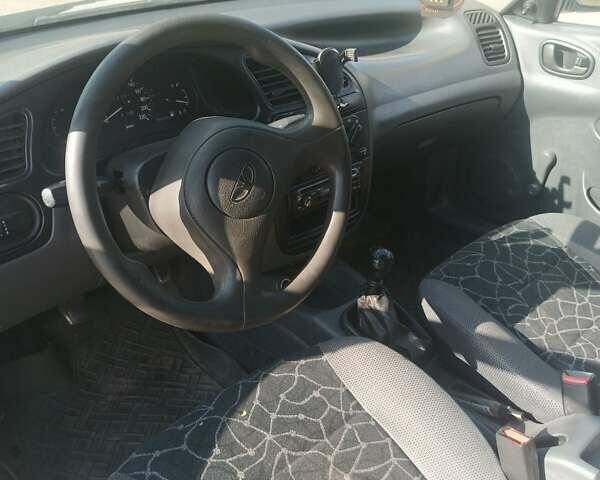 Серый Дэу Ланос, объемом двигателя 1.5 л и пробегом 240 тыс. км за 1350 $, фото 4 на Automoto.ua