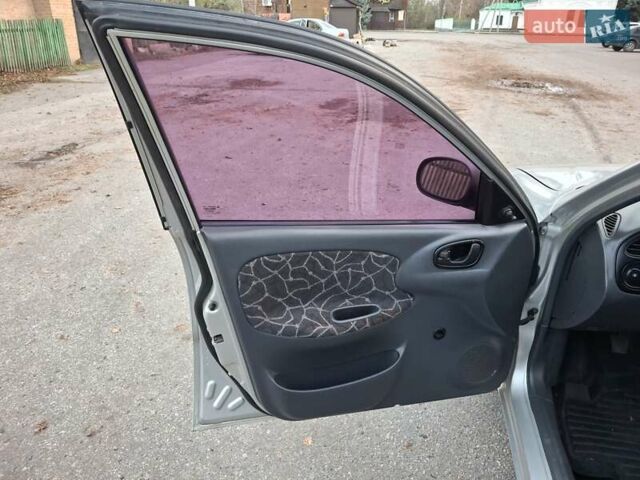 Сірий Деу Ланос, об'ємом двигуна 1.5 л та пробігом 227 тис. км за 2850 $, фото 38 на Automoto.ua