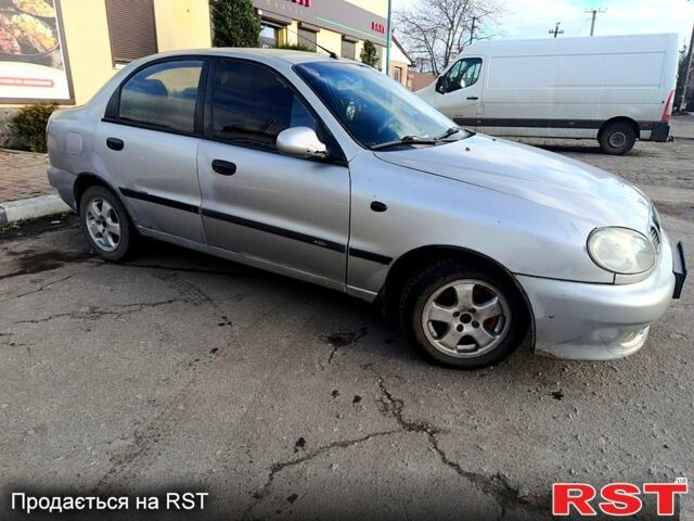 Серый Дэу Ланос, объемом двигателя 1.6 л и пробегом 340 тыс. км за 2000 $, фото 3 на Automoto.ua