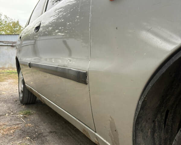 Сірий Деу Ланос, об'ємом двигуна 0 л та пробігом 254 тис. км за 1450 $, фото 3 на Automoto.ua