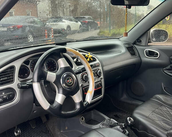 Серый Дэу Ланос, объемом двигателя 1.5 л и пробегом 299 тыс. км за 1299 $, фото 5 на Automoto.ua