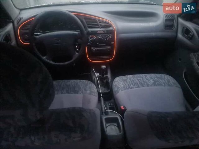 Серый Дэу Ланос, объемом двигателя 1.5 л и пробегом 198 тыс. км за 1850 $, фото 4 на Automoto.ua