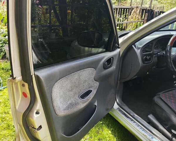 Серый Дэу Ланос, объемом двигателя 1.5 л и пробегом 300 тыс. км за 1750 $, фото 24 на Automoto.ua